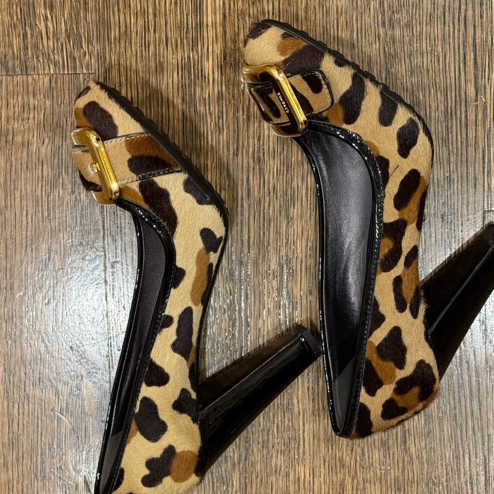 Prada The original car shoe
Chic Leopard Print Heels with Gold Accent
